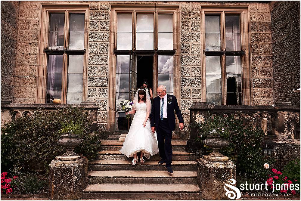 A beautiful journey to document as the bride walks on her fathers arm to the ceremony at Heath House in Tean by Heath House Wedding Photographers Stuart James