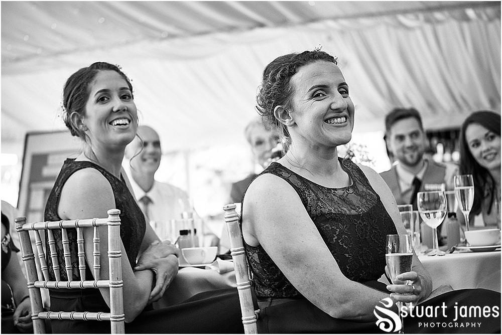 Capturing the Grooms speech and the reactions of the guests at Heath House in Tean by Heath House Wedding Photographers Stuart James
