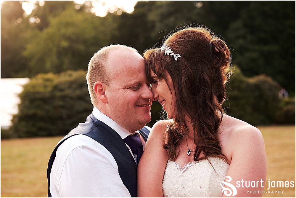 Relaxed beautiful portraits at golden hour with our bride and groom at Heath House in Tean by Heath House Wedding Photographers Stuart James