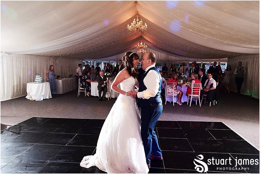 Capturing the fabulous first dance with creative photographs at Heath House in Tean by Heath House Wedding Photographers Stuart James