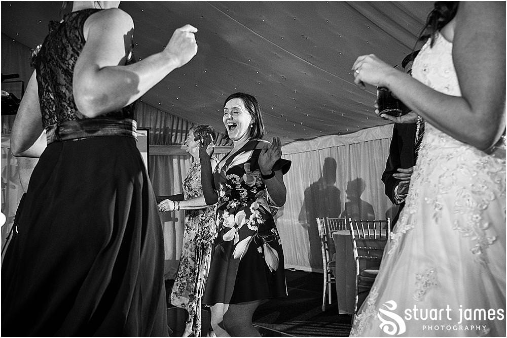 One fabulous party soon got underway with the floor full at Heath House in Tean by Heath House Wedding Photographers Stuart James