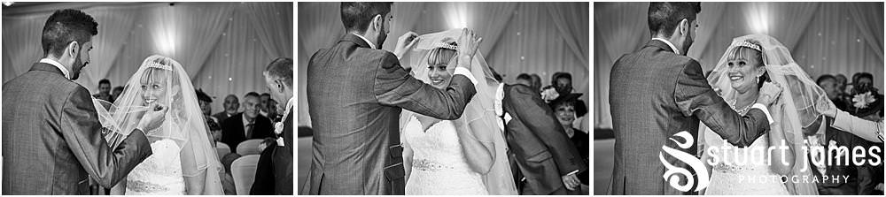 Creative photographs capturing the beautiful wedding ceremony at The Moat House in Acton Trussell - Recommended Stafford Wedding Photographers Stuart James