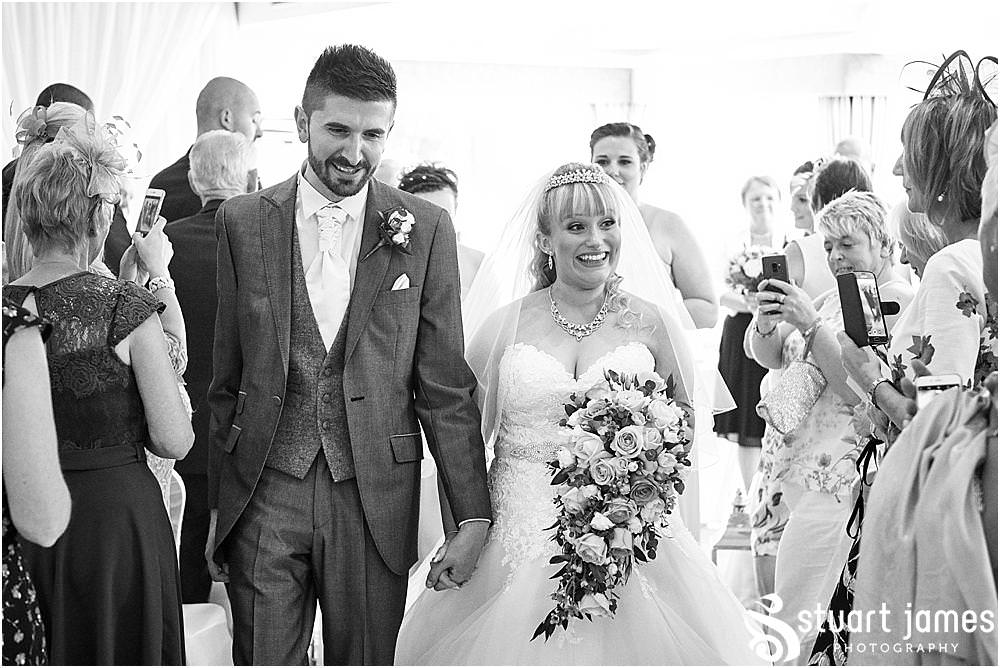 Creative photographs capturing the beautiful wedding ceremony at The Moat House in Acton Trussell - Recommended Stafford Wedding Photographers Stuart James