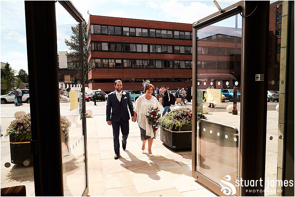 Capturing the arrival of the guests for the wedding at Stafford Registry Office in Stafford by Stafford Registry Office Wedding Photographers Stuart James