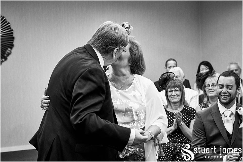 Unobtrusive storytelling photography of the wedding ceremony at Stafford Registry Office in Stafford by Stafford Registry Office Wedding Photographers Stuart James
