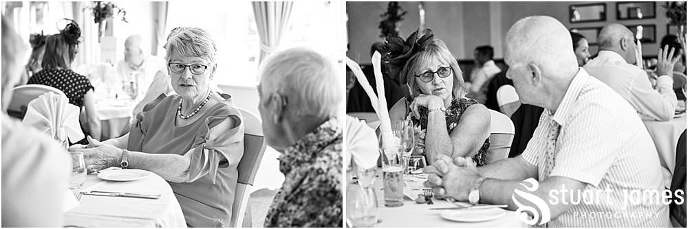 Creative candid photographs as the guests enjoy the wedding breakfast in the acton suite at The Moat House in Stafford - Stafford Registry Office Wedding Photographers Stuart James