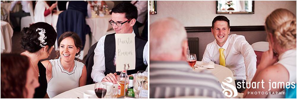 Creative candid photographs as the guests enjoy the wedding breakfast in the acton suite at The Moat House in Stafford - Stafford Registry Office Wedding Photographers Stuart James
