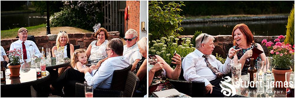 Relaxed evening photographs as the guests enjoy the wedding reception at The Moat House in Stafford - Stafford Registry Office Wedding Photographers Stuart James