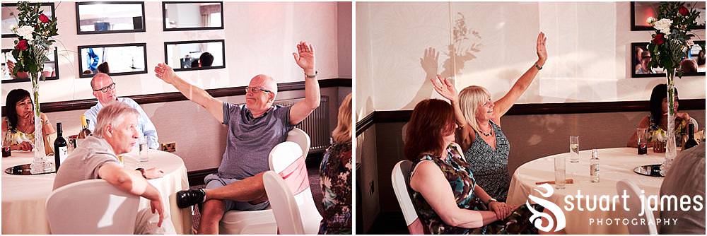 Stunning photographs as the guests enjoy the Neil Diamond tribute at The Moat House in Stafford - Stafford Registry Office Wedding Photographers Stuart James