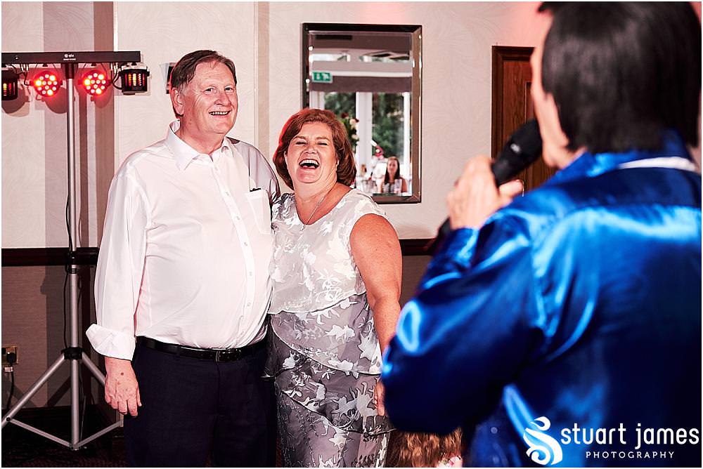 Stunning photographs as the guests enjoy the Neil Diamond tribute at The Moat House in Stafford - Stafford Registry Office Wedding Photographers Stuart James