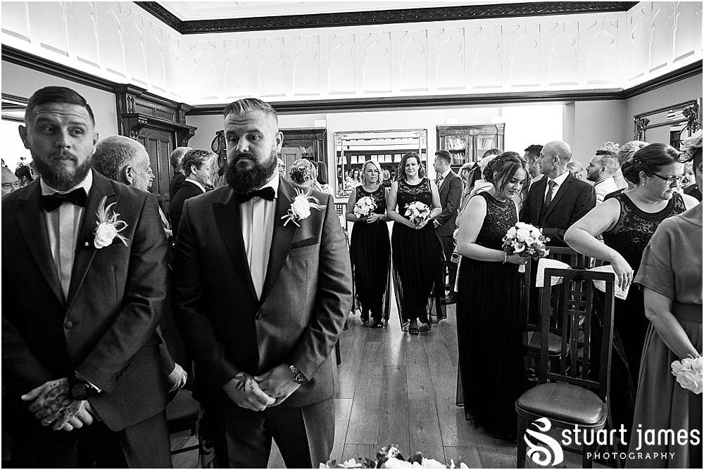 The many emotions of the groom and groomsmen nervously await the bridal party at Pendrell Hall in Codsall Wood by Staffordshire Recommended Wedding Photographer Stuart James