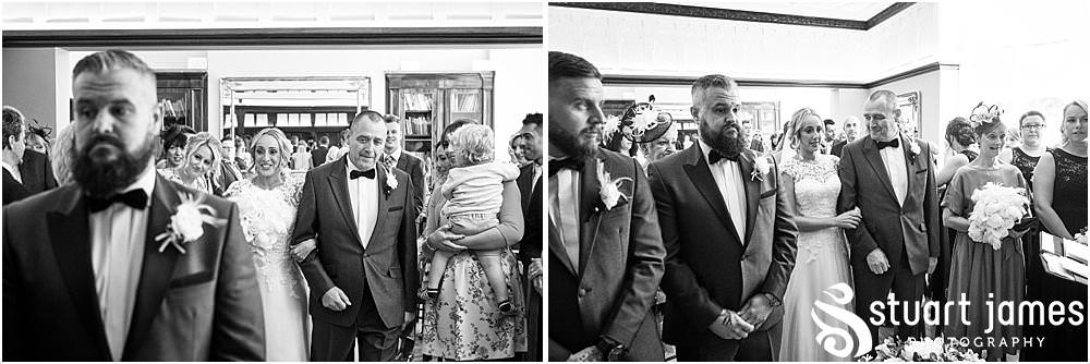 Such incredible moments to capture as the bride walks in to the ceremony with her father at Pendrell Hall in Codsall Wood by Staffordshire Recommended Wedding Photographer Stuart James