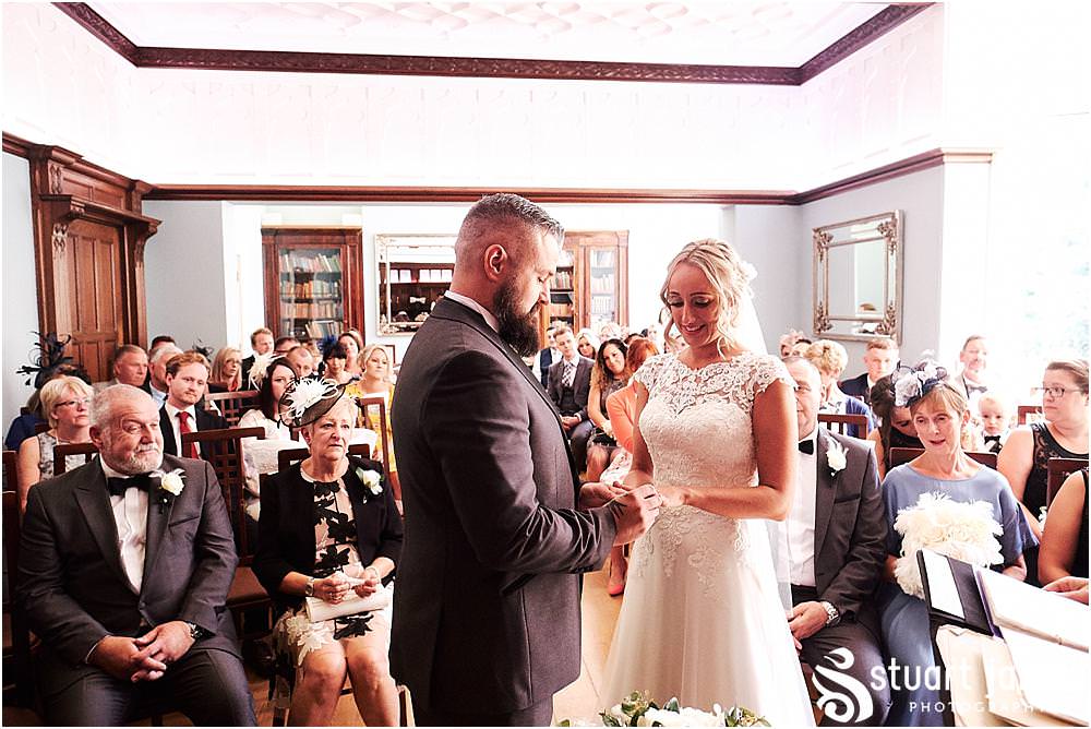Unobtrusive photos that capture the story of the wedding ceremony at Pendrell Hall in Codsall Wood by Staffordshire Recommended Wedding Photographer Stuart James