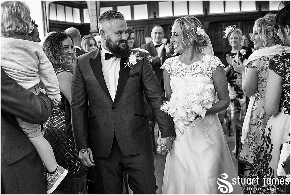 The fabulous expressions on the bride and groom are beautiful to see and capture as they take their first journey as husband and wife at Pendrell Hall in Codsall Wood by Staffordshire Recommended Wedding Photographer Stuart James