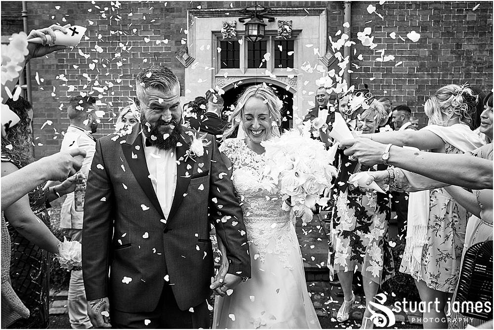 I love a fabulous confetti exit at Pendrell Hall in Codsall Wood by Staffordshire Recommended Wedding Photographer Stuart James