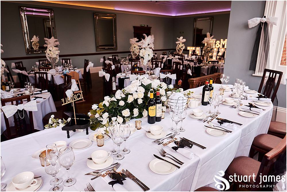 The wedding breakfast room looked stunning decorated by family friend Joanne at Pendrell Hall in Codsall Wood by Staffordshire Recommended Wedding Photographer Stuart James