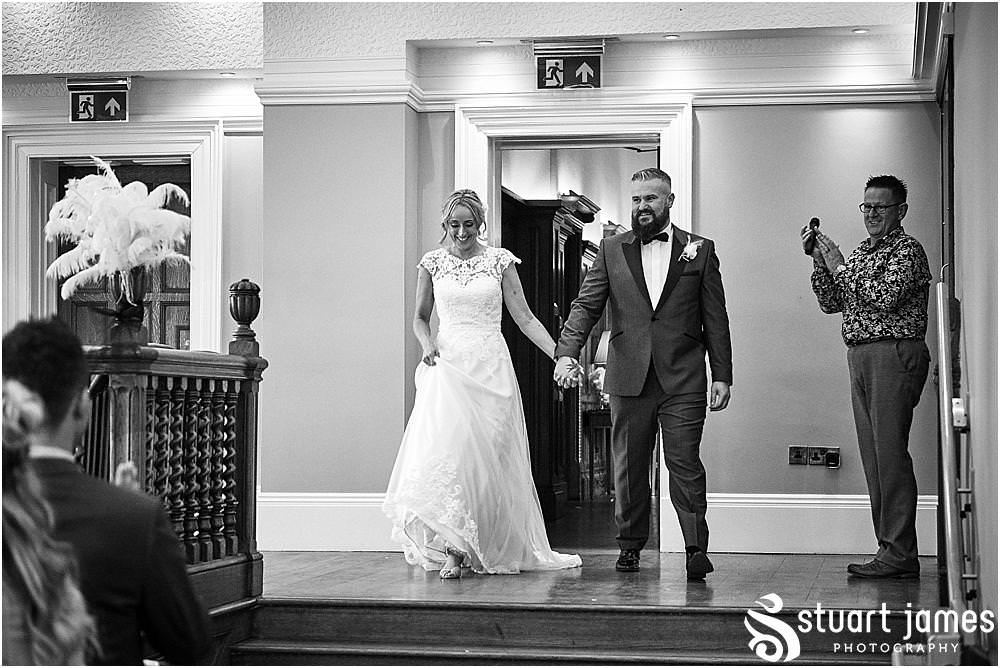 So much excitement as the guests relax into the setting for the wedding breakfast at Pendrell Hall in Codsall Wood by Staffordshire Recommended Wedding Photographer Stuart James