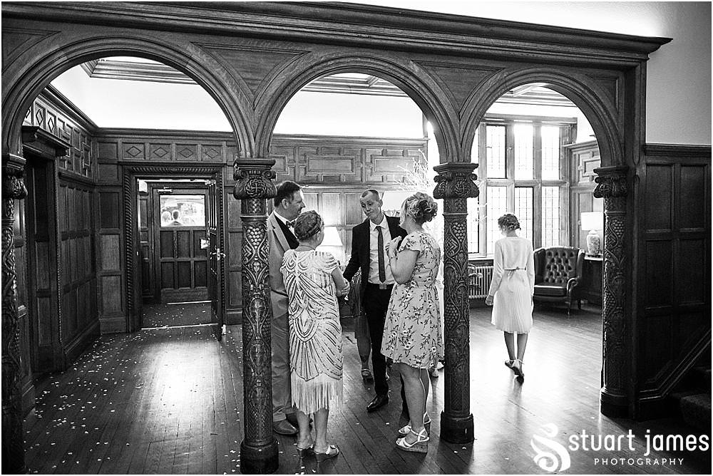 Creative candid photos as the guests kick back and enjoy the evening reception at Pendrell Hall in Codsall Wood by Staffordshire Recommended Wedding Photographer Stuart James