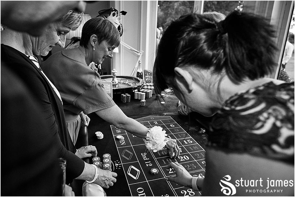 The casino from Royale Casinos was a great addition and filled the evening reception fabulously at Pendrell Hall in Codsall Wood by Staffordshire Recommended Wedding Photographer Stuart James