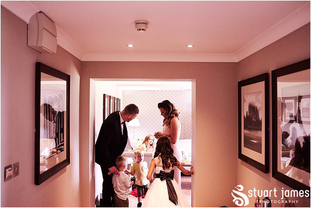 Final preparations for the bridal party at The Belfry in Sutton Coldfield - Belfry Wedding Photography by Docuemntary Wedding Photographer Stuart James