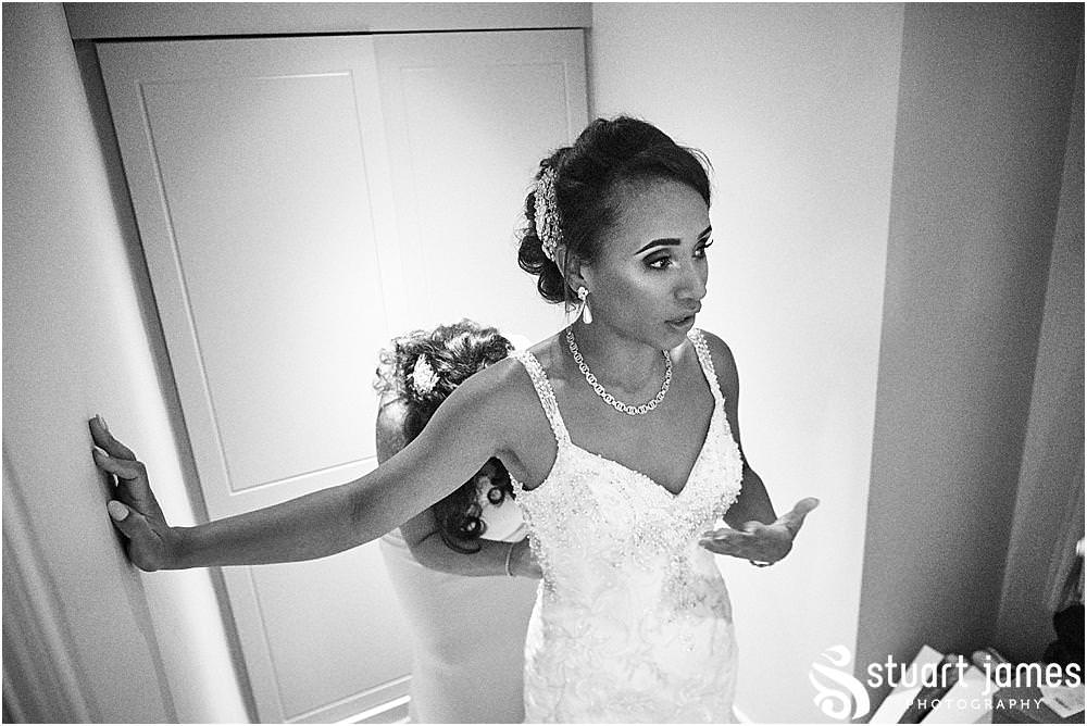 Final preparations for the bridal party at The Belfry in Sutton Coldfield - Belfry Wedding Photography by Docuemntary Wedding Photographer Stuart James