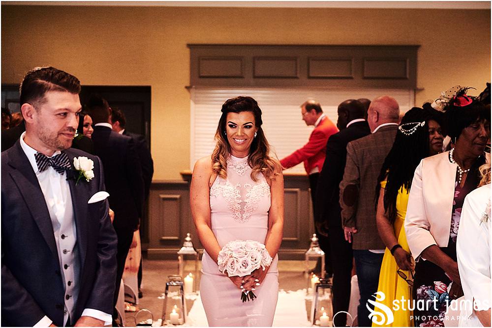 So much emotion during the procession into the wedding ceremony at The Belfry in Sutton Coldfield - Belfry Wedding Photography by Docuemntary Wedding Photographer Stuart James