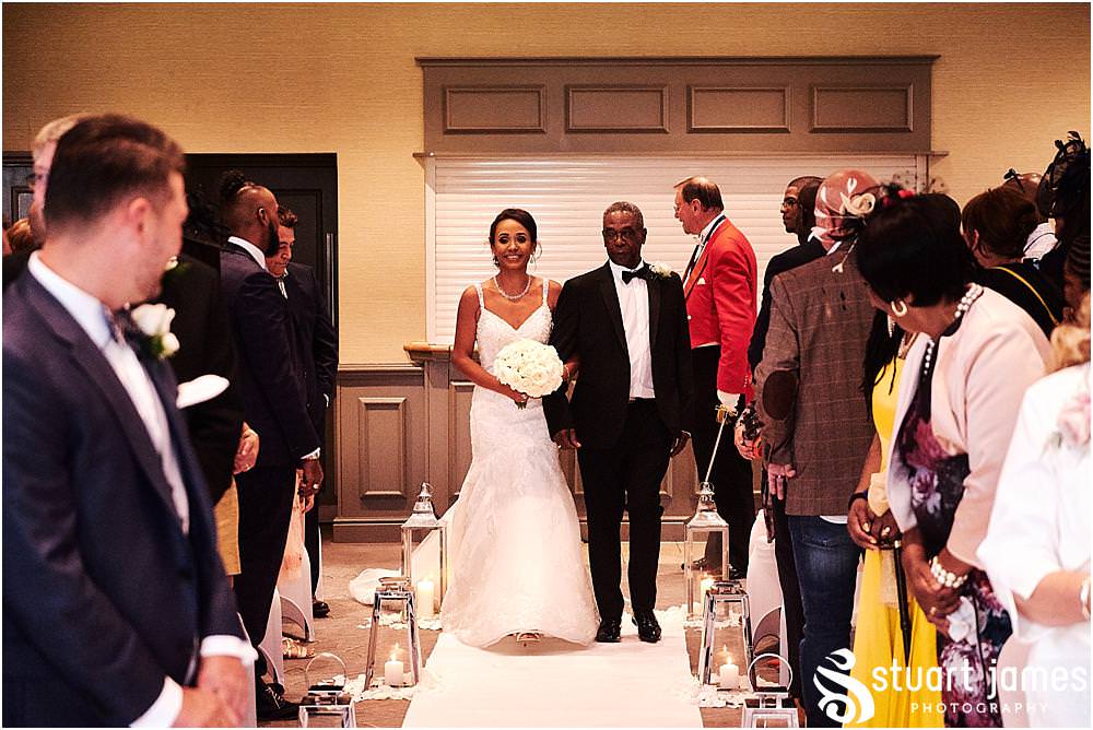 So much emotion during the procession into the wedding ceremony at The Belfry in Sutton Coldfield - Belfry Wedding Photography by Docuemntary Wedding Photographer Stuart James