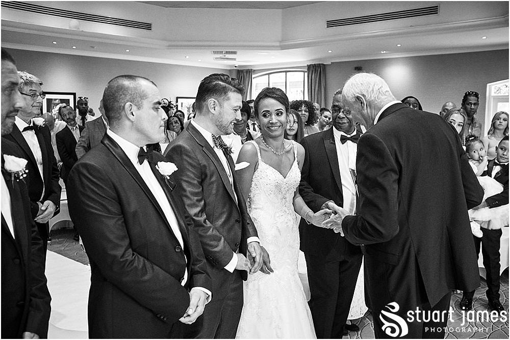 So much emotion during the procession into the wedding ceremony at The Belfry in Sutton Coldfield - Belfry Wedding Photography by Docuemntary Wedding Photographer Stuart James