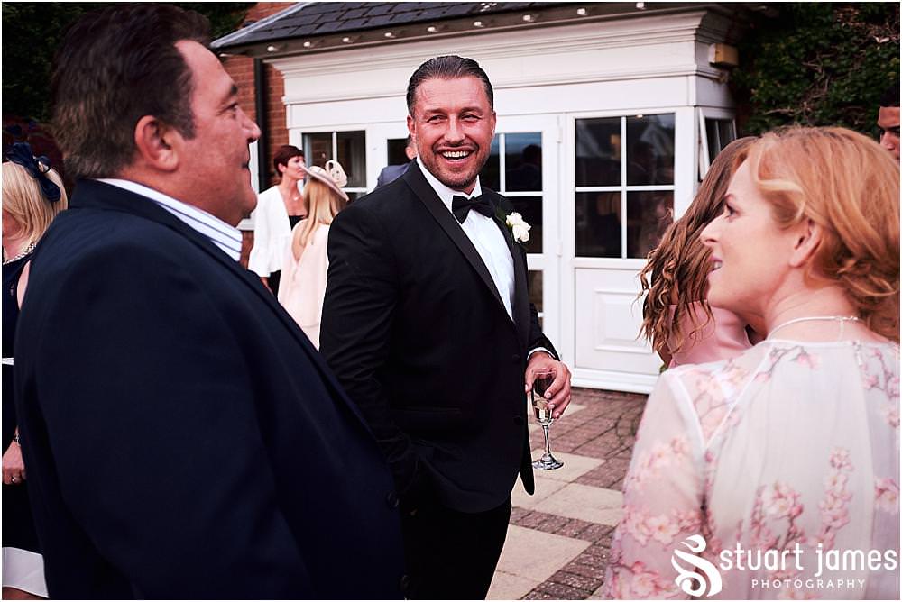 So much fun at the start of the evening reception at The Belfry in Sutton Coldfield - Belfry Wedding Photography by Docuemntary Wedding Photographer Stuart James