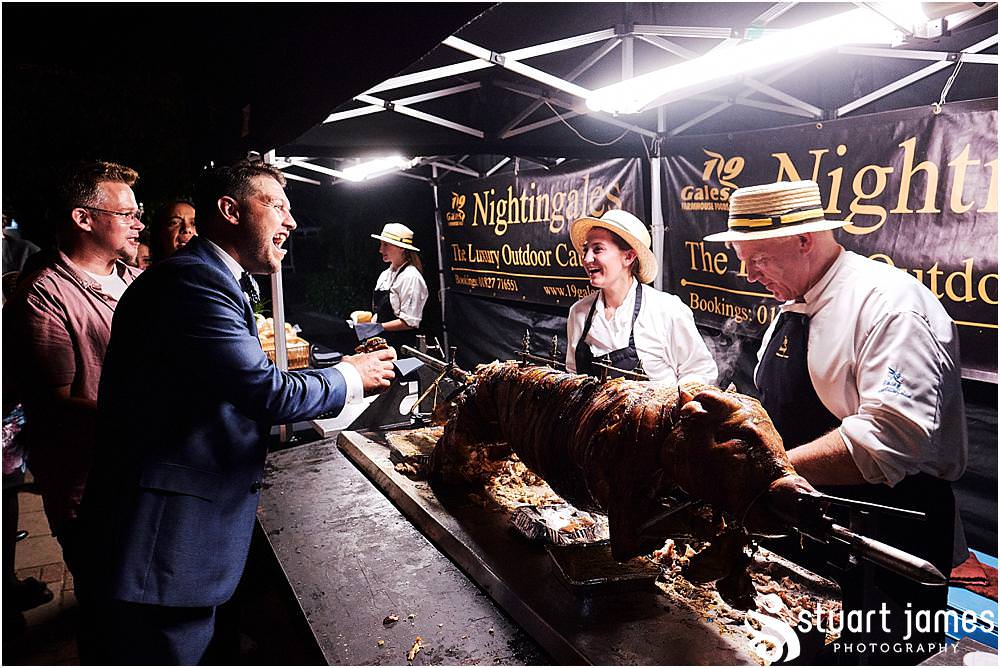 What better than a hog roast for the evening food at The Belfry in Sutton Coldfield - Belfry Wedding Photography by Docuemntary Wedding Photographer Stuart James