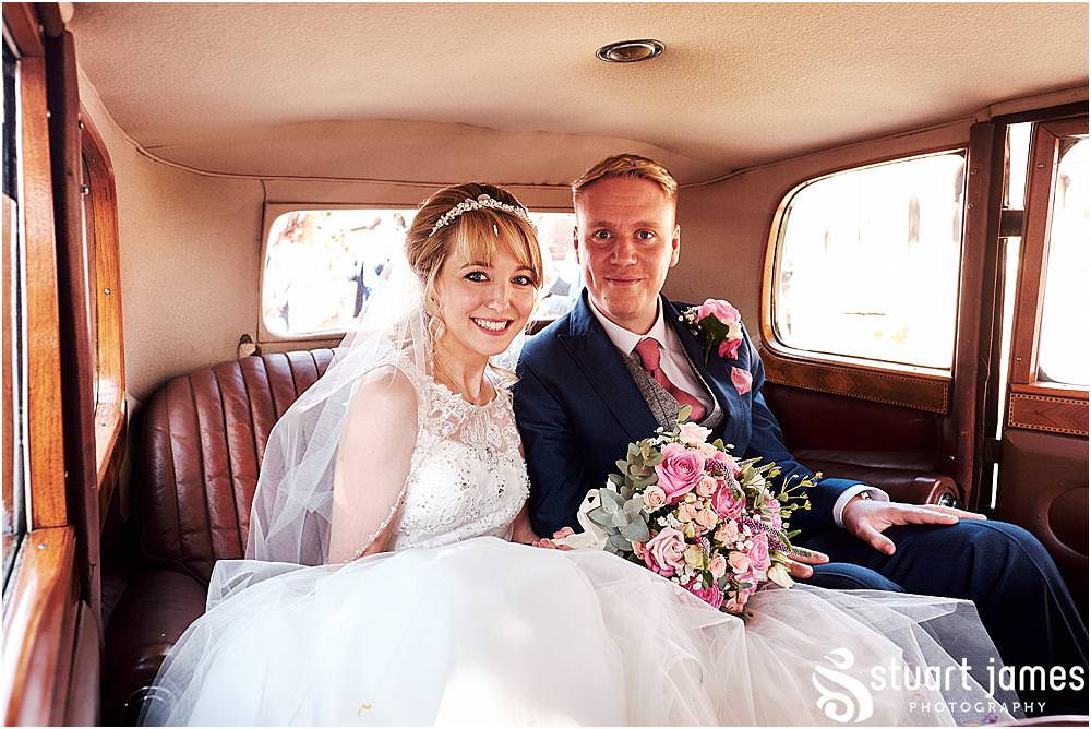 Travelling in style to the wedding reception at Blakelands in Staffordshire by Documentary Wedding Photographer Stuart James