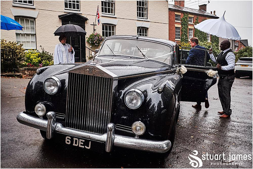 Bride and Father of the Bride arrive at the Holy Trinity Church in a Rolls Royce wedding car, photo by Stuart James Photography at Holy Trinity, Eccleshall
