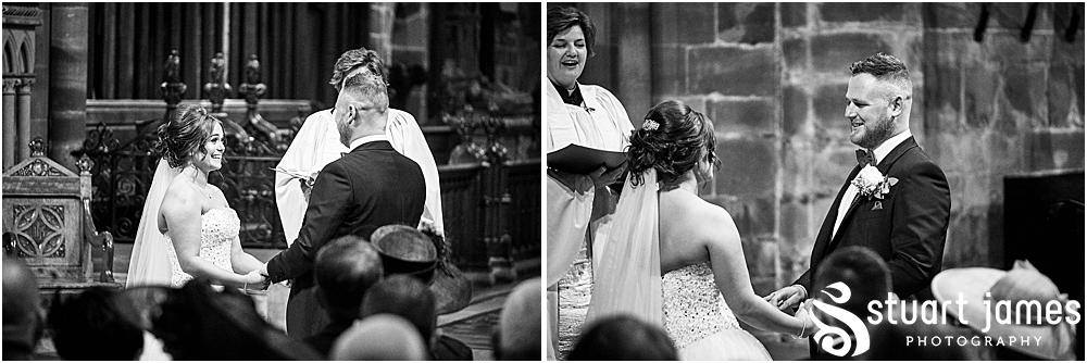 Vicar, Bride and Groom stand at the altar and exchange vows, photo by Stuart James Photography at Holy Trinity, Eccleshall