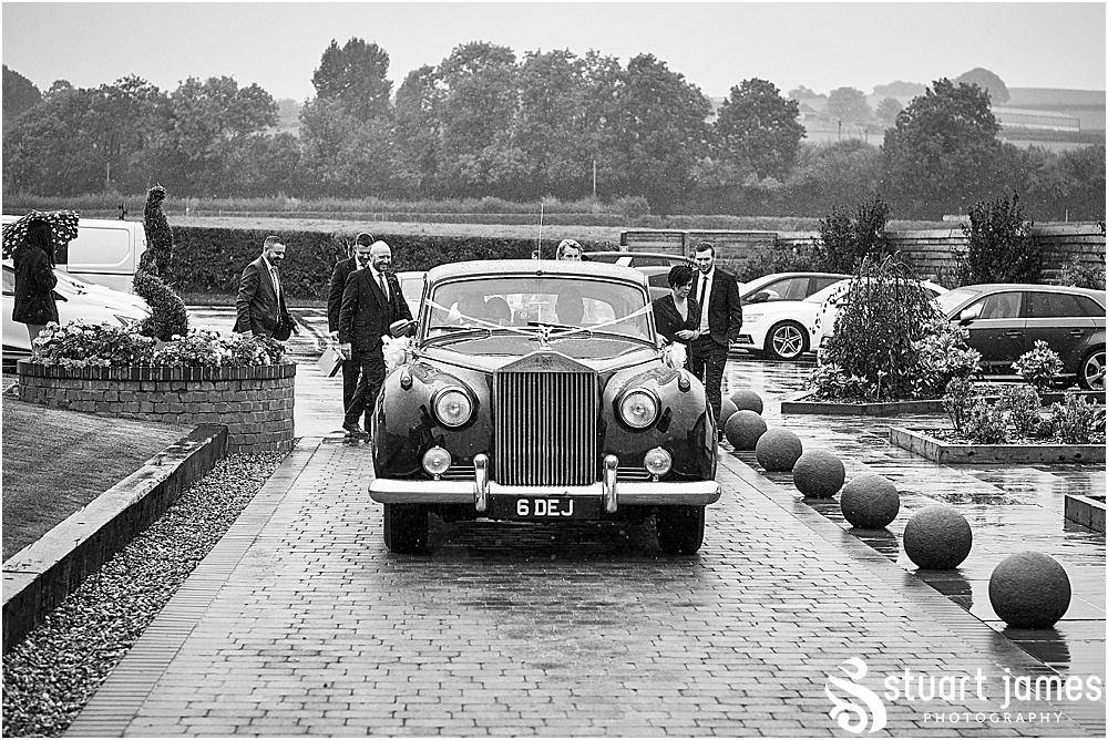 Married couple arrive in Rolls Royce at Aston Marina for their wedding reception, photo by Stuart James Photography at Aston Marina, Stone.