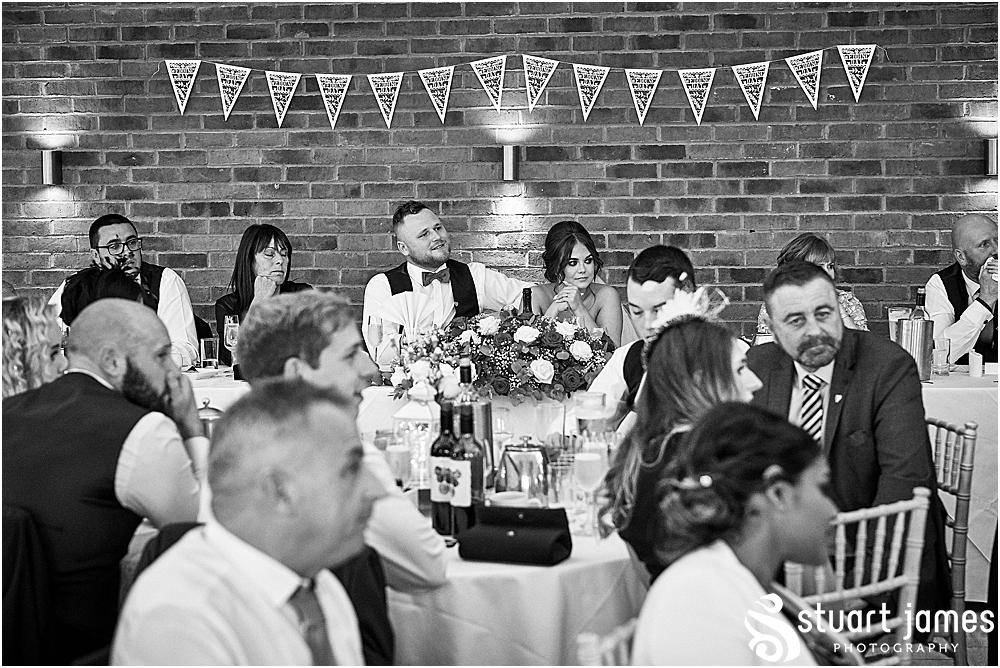 Wedding guests listen to speech, photo by Stuart James Photography at Aston Marina, Stone.