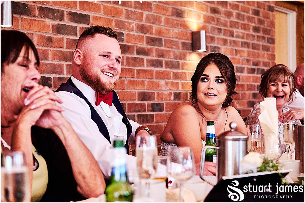 Bride and Groom sat at top table, photo by Stuart James Photography at Aston Marina, Stone