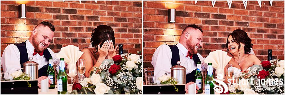 Bride and Groom laughing at best mans speech, photo by Stuart James Photography at Aston Marina, Stone