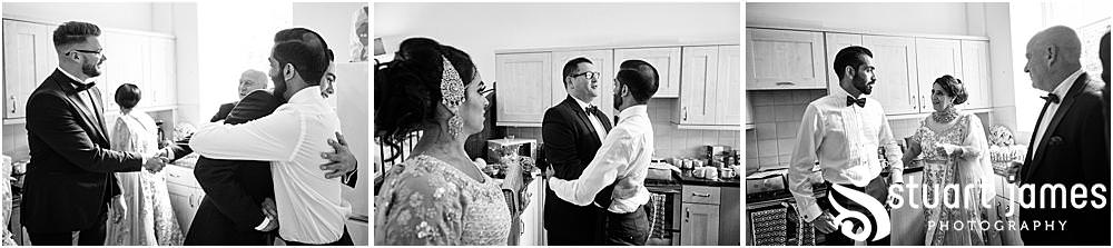 Grooms family embrace Groom in house after getting ready at Davenport House in Shropshire by Davenport House Wedding Photographers Stuart James