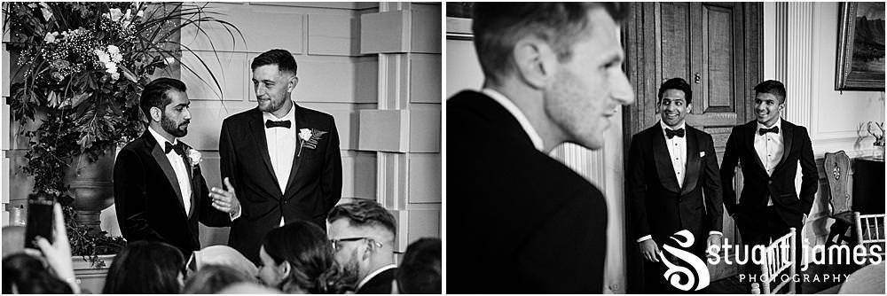 Groomsmen wait patiently at the top of the aisle for Bride at Davenport House in Shropshire by Davenport House Wedding Photographers Stuart James
