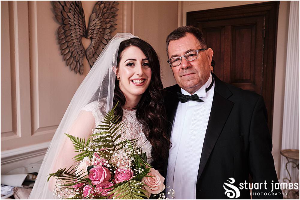 Bride and Father of the Bride pose for portrait photo at Davenport House in Shropshire by Davenport House Wedding Photographers Stuart James