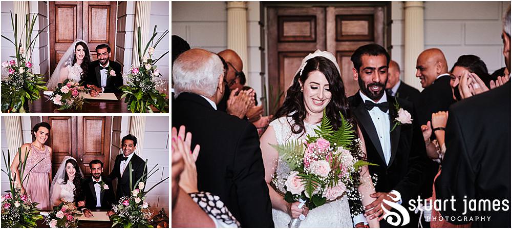 Bride and Groom and witnesses sign wedding register, Bride and Groom then leave ceremony down the aisle at Davenport House in Shropshire by Davenport House Wedding Photographers Stuart James