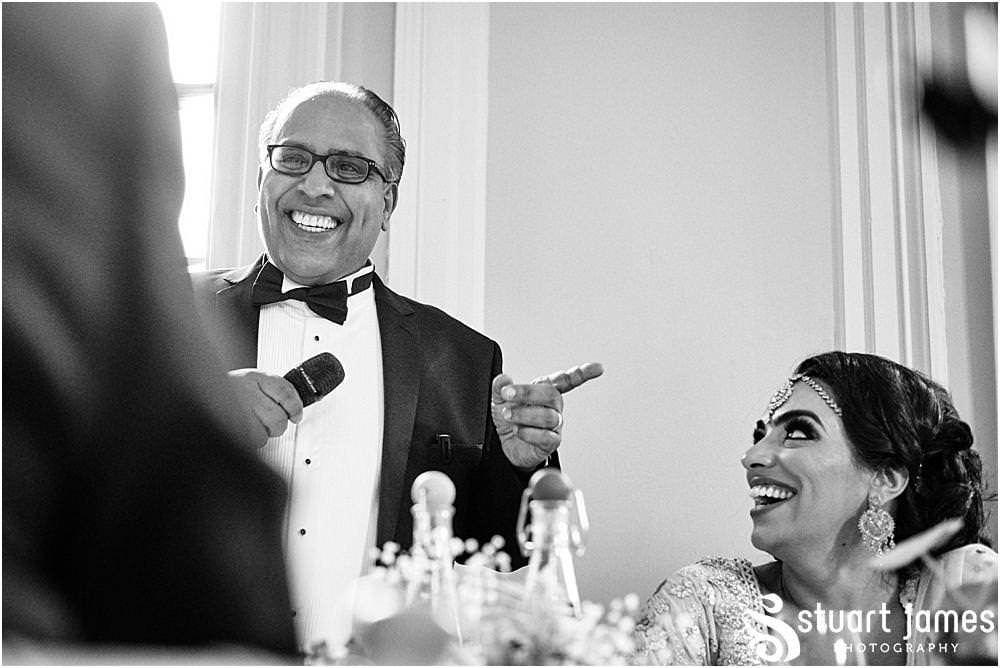 Father of the Groom makes wedding guests laugh whilst doing speech at Davenport House in Shropshire by Davenport House Wedding Photographers Stuart James