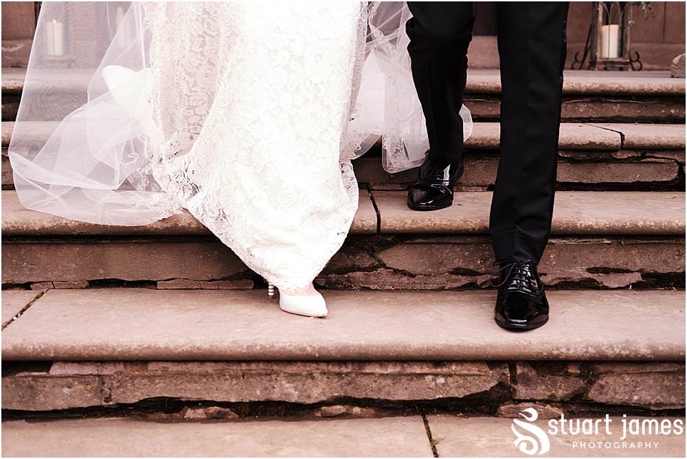 Bride and Groom walk down front steps at Davenport House in Shropshire by Davenport House Wedding Photographers Stuart James