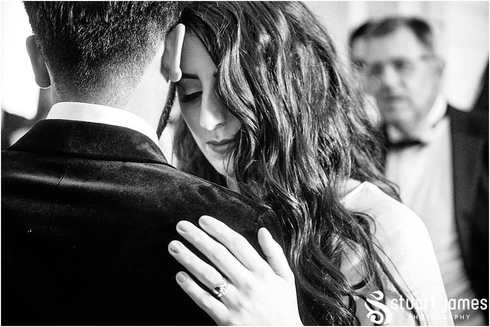 Bride and Groom dance to live music amongst wedding guests at Davenport House in Shropshire by Davenport House Wedding Photographers Stuart James