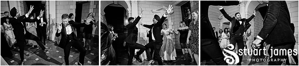 Wedding guests dancing at Davenport House in Shropshire by Davenport House Wedding Photographers Stuart James