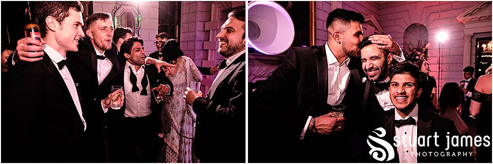 Wedding guests dance at Davenport House in Shropshire by Davenport House Wedding Photographers Stuart James