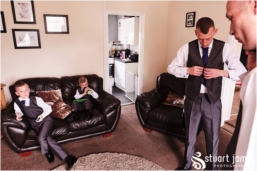 Groom getting ready before wedding at The Village Hotel, Walsall, photo by Stuart James Photography