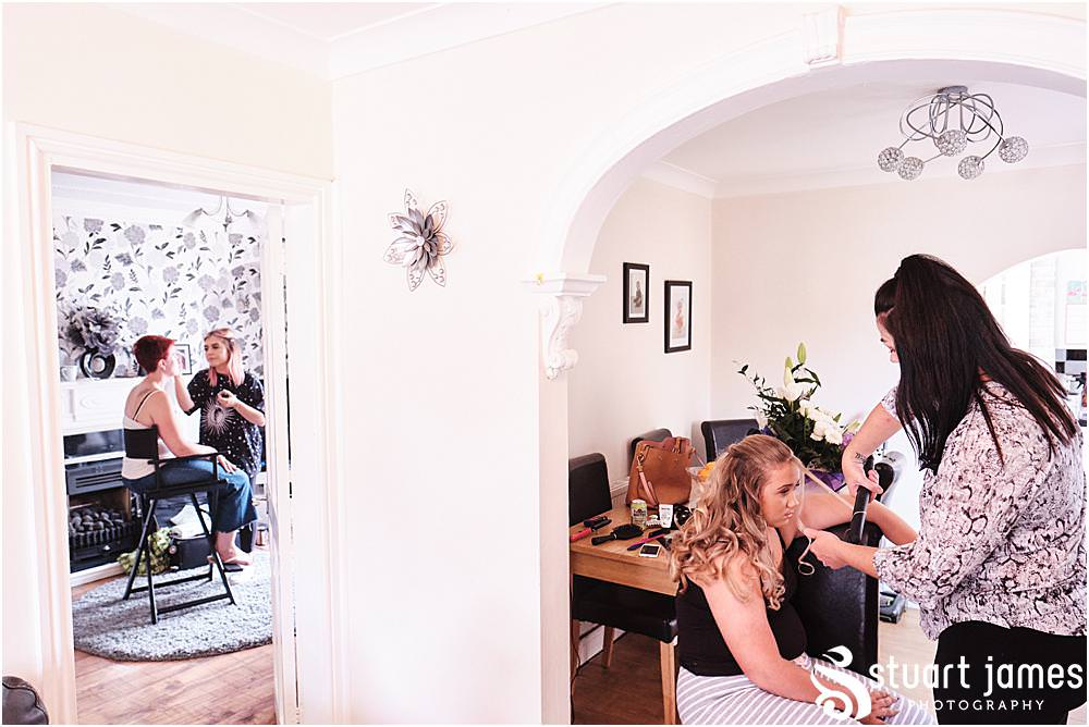 Bridesmaid having hair styled before wedding at The Village Hotel, Walsall, photo by Stuart James Photography