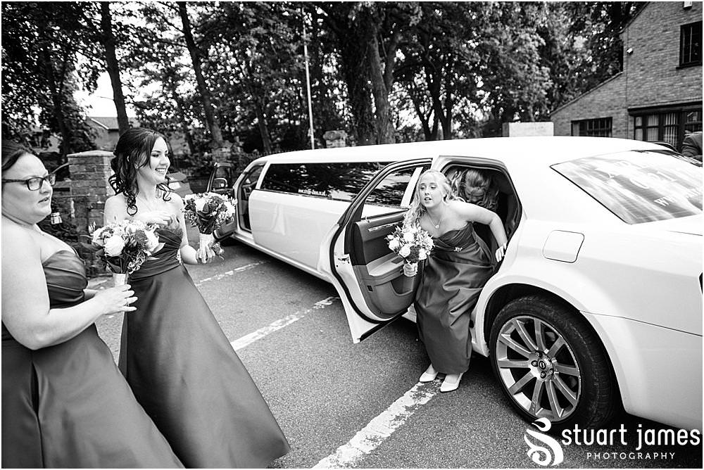 Bridesmaid arrive at Holy Trinity Church in Eccleshall, photo by Stuart James Photography at Holy Trinity Church, Eccleshall