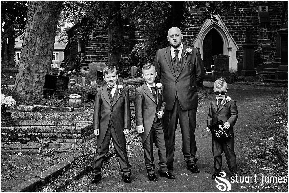 Groom and Page Boys wait at Holy Trinity Church in Eccleshall, photo by Stuart James Photography at Holy Trinity Church, Eccleshall